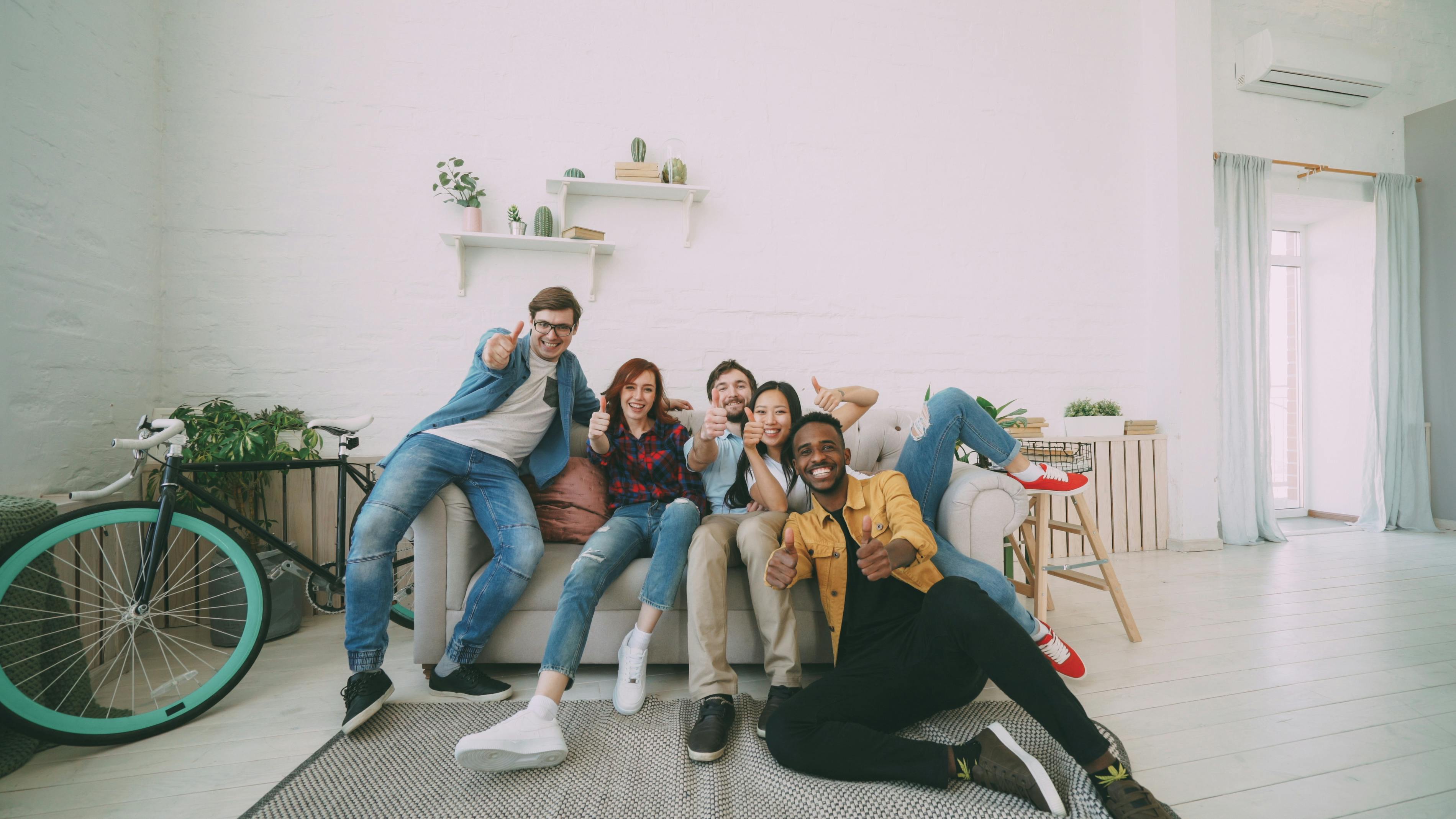Diverse%20Happy%20Tenants%20on%20a%20Couch Diverse happy tenants on a couch